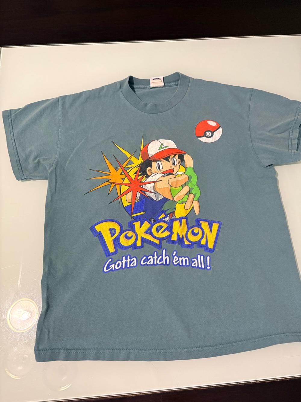 Pokemon Short Sleeve Tee with Blue-Green Base and Multicolor Graphic
